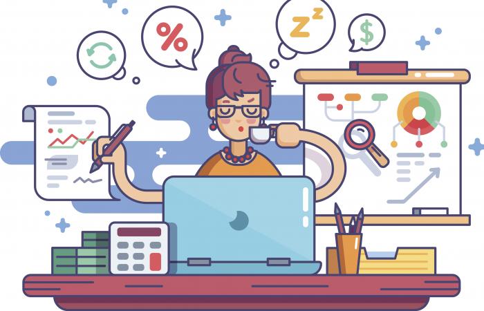 Frau rechnet am Computer